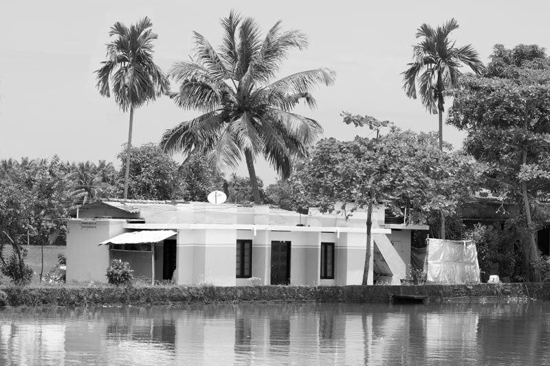 A human settlement on reclaimed land in the Kuttanad wetlands in Alappuzha district, Kerala